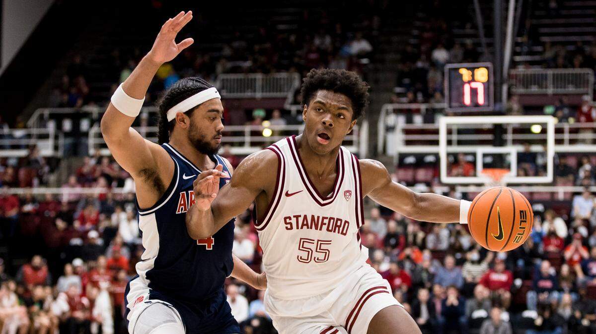 Stanford Cardinal forward Harrison Ingram (55) drives against Arizona Wildcats guard Kylan Boswell (4) during the first half at Maples Pavilion on Feb. 11, 2023.