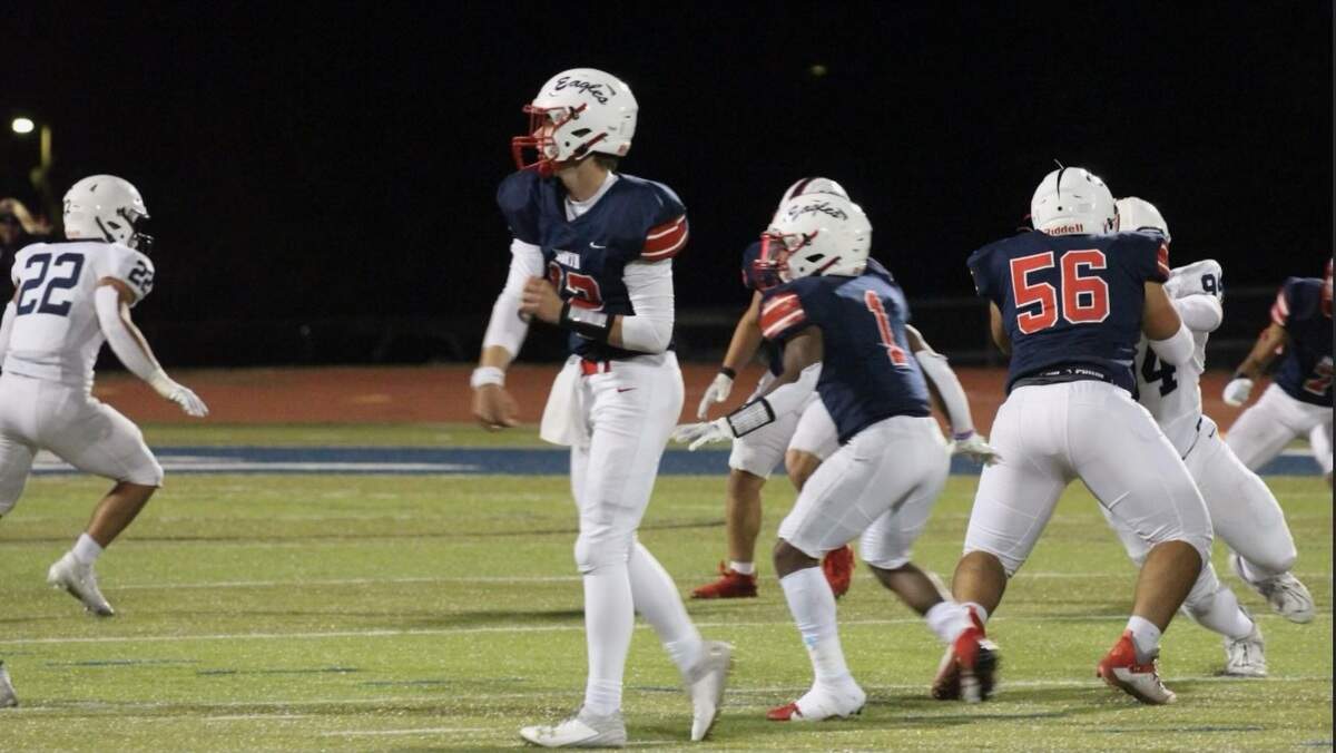 Jackson Sarver, a senior quarterback from Olathe North High School