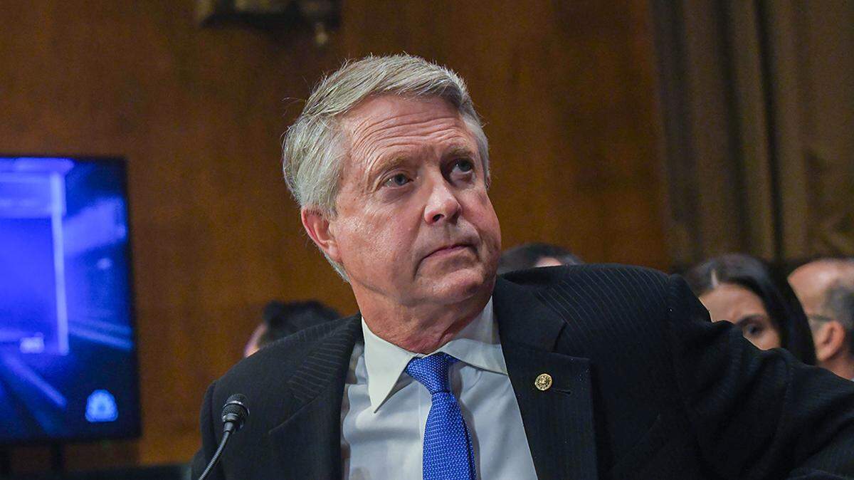 United States Senator Roger Marshall (Republican of Kansas) watches a short video about the rise of interchange fees for MasterCards, at the Senate Judiciary Committee hearings to examine breaking the Visa-Mastercard duopoly, focusing on bringing competition and lower fees to the credit card system.Credit: Mattie Neretin / CNP/Sipa USA