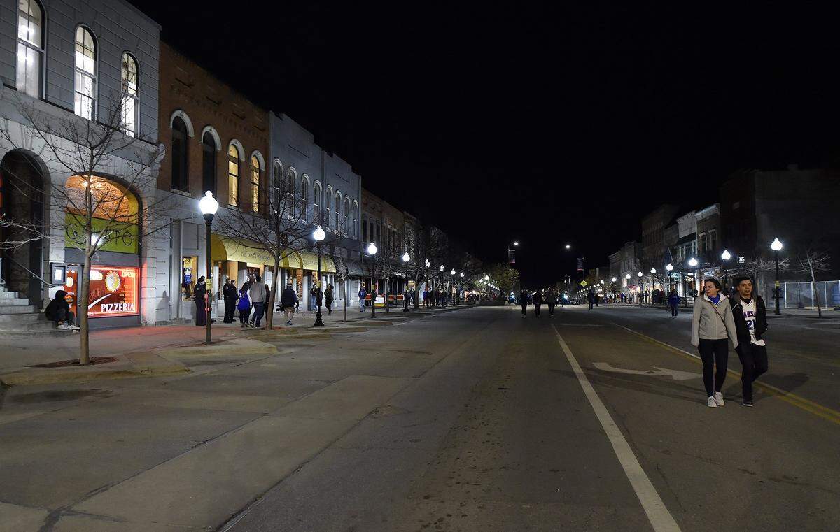 Unlike last Sunday, when Kansas beat Duke and Jayhawk fans mobbed Massachusetts Street, the same street, this time closed off to traffic, was quiet. Kansas fell to Villanova 95-79 in the NCAA semifinal game Saturday, March 31, 2018.