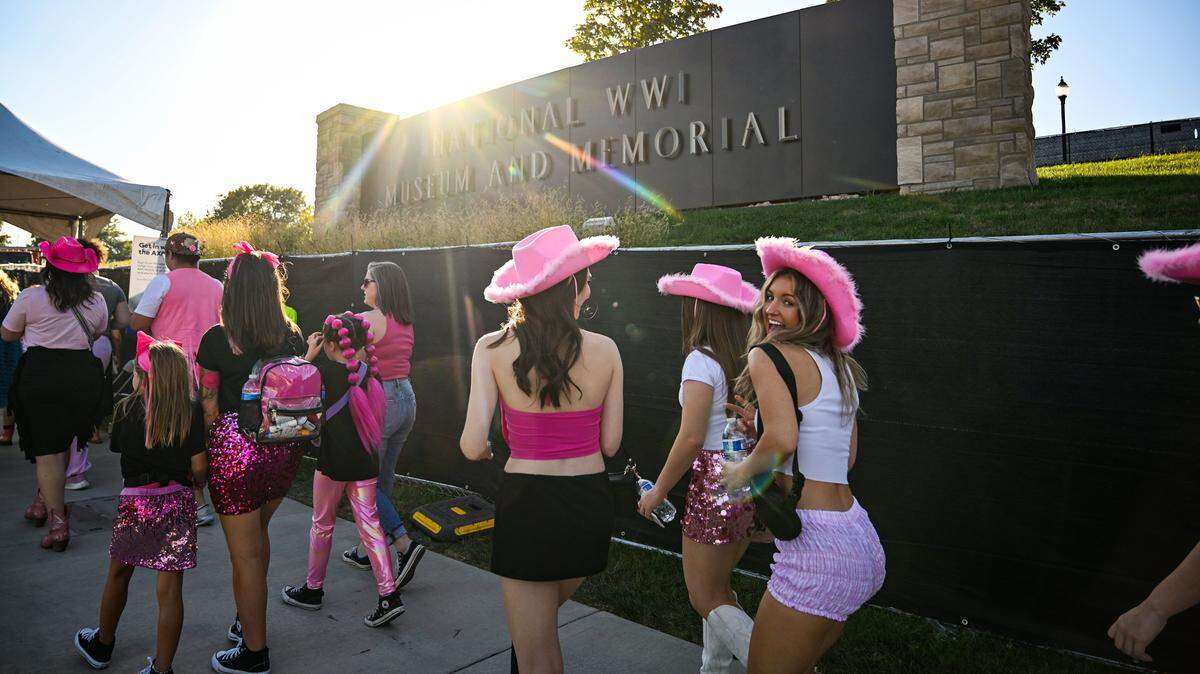 Fan file into the entry gates for the Chappell Roan concert on Saturday, Oct. 4, 2025, at the National WWI Museum and Memorial in Kansas City.