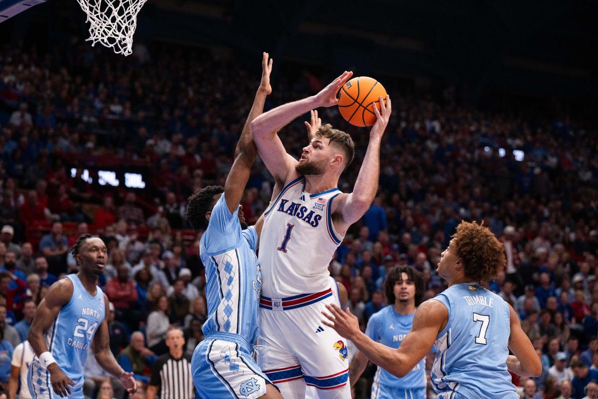 University of Kansas center Hunter Dickinson put up a shot against the defense from the North Carolina Tar Heels during a game at Allen Fieldhouse on Nov. 9, 2024. It was the first time Kansas City Star photographer Dominick Williams covered a game at the fieldhouse. His previous experience at the Allen Fieldhouse was working there as a custodian.