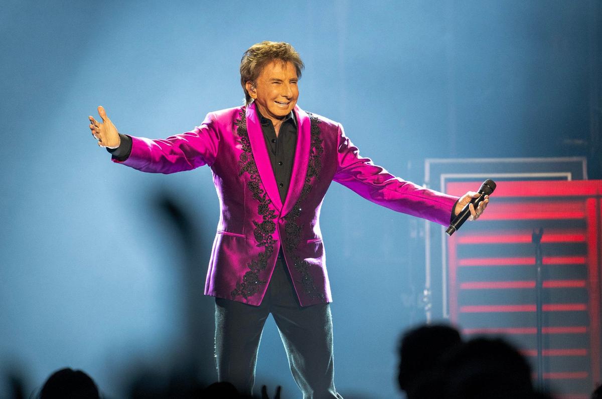 Barry Manilow performs on stage at the T-Mobile Center Sunday during a stop in Kansas City as part of The Last Concerts Tour.