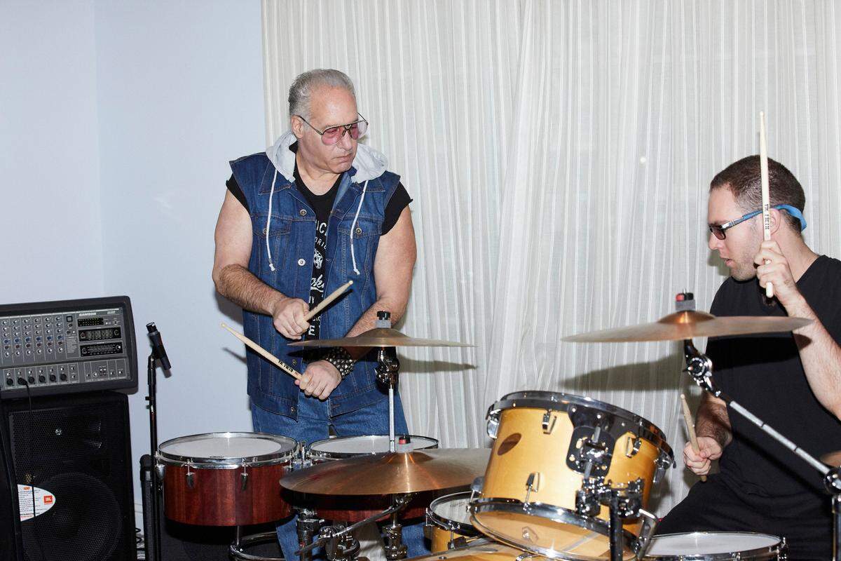 Andrew Dice Clay and his son Max in the living room-turned-rehearsal-space at Clay’s home in Los Angeles.