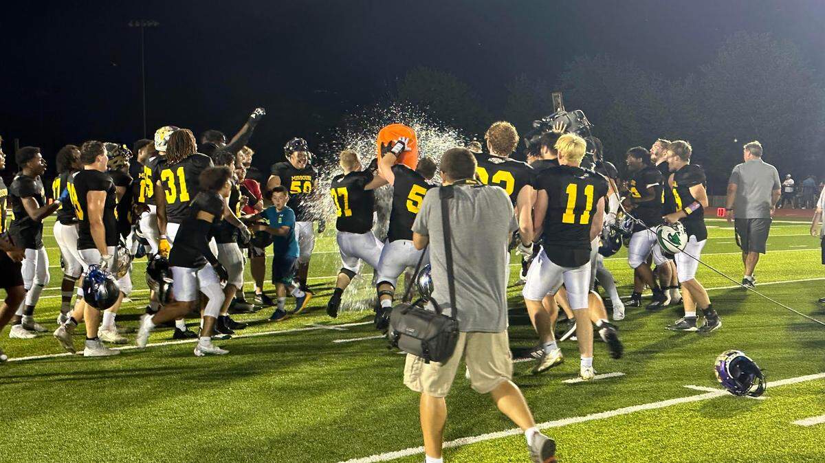 Team Missouri players give their head coach, Brock Bult from Fort Osage, a Gatorade shower after a 16-8 victory over team Kansas in the Be YOUnion All-Star Game on June 16, 2023.