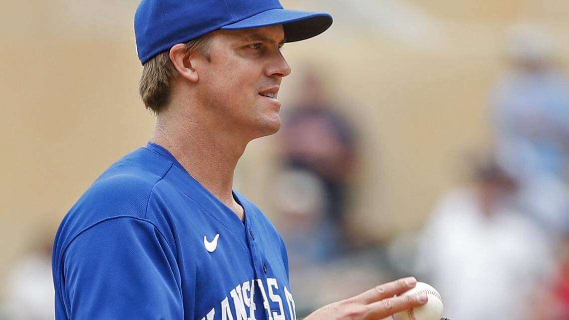 Kansas City Royals starting pitcher Zack Greinke reacts after giving up back-to-back solo home runs to the Minnesota Twins in the fourth inning of a baseball game Sunday, May 29, 2022, in Minneapolis. (AP Photo/Bruce Kluckhohn)