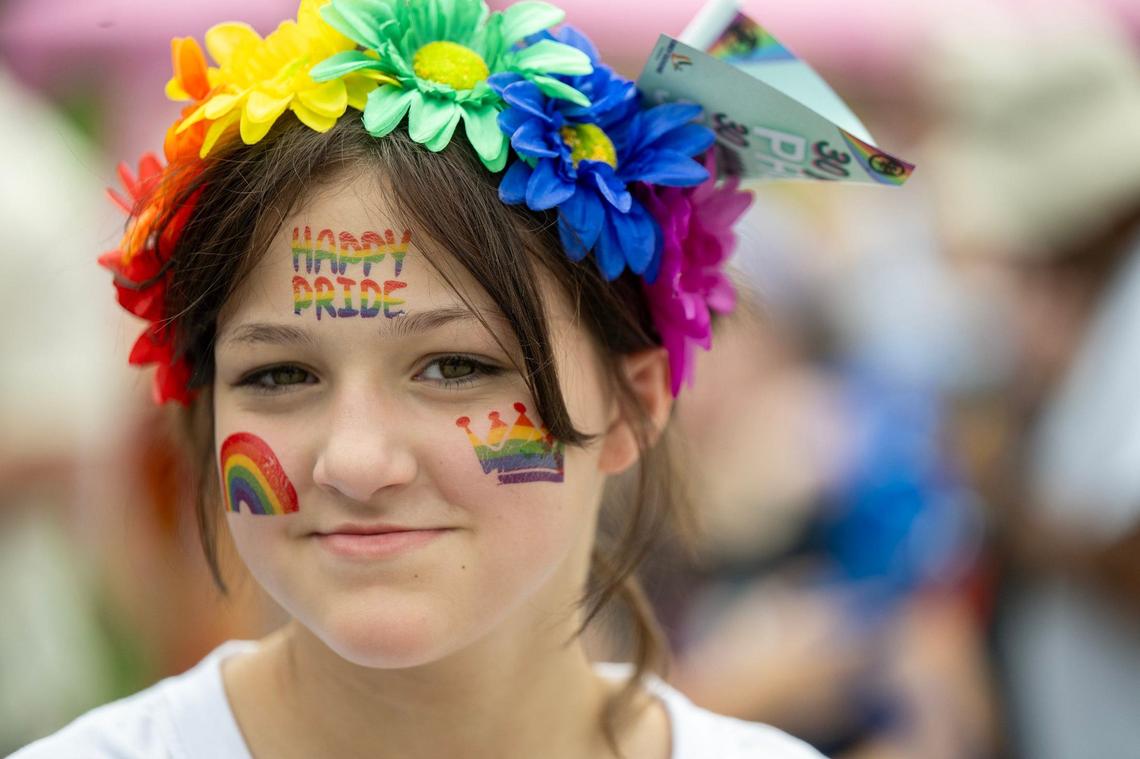 Ramona Gant, 12, of Kansas City, supported their pride on their face and hair during the KC Pride Parade,