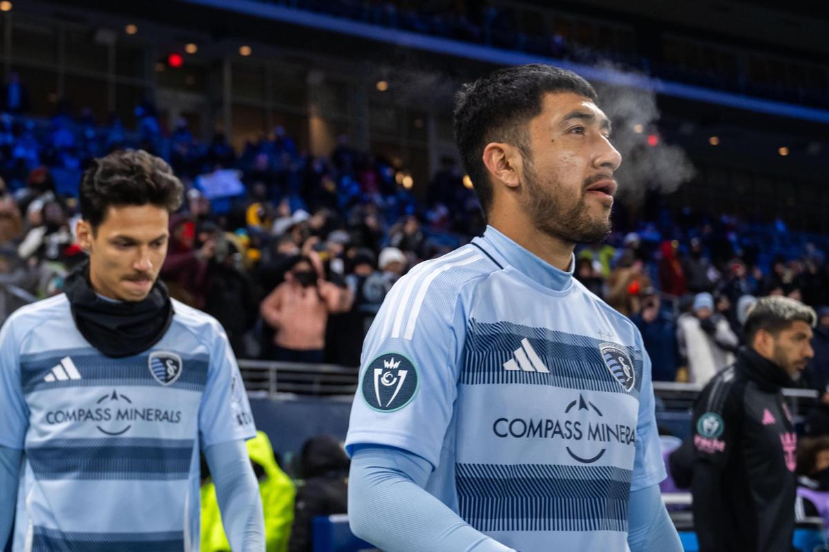 Sporting KC players walk onto the pitch for the beginning of the Concacaf Champions Cup match of Sporting KC vs. Inter Miami CF on Wednesday, Feb. 19, 2025, at Sporting Park. The temperatures were in the single digits for the game that Sporting KC lost to Miami 0-1.