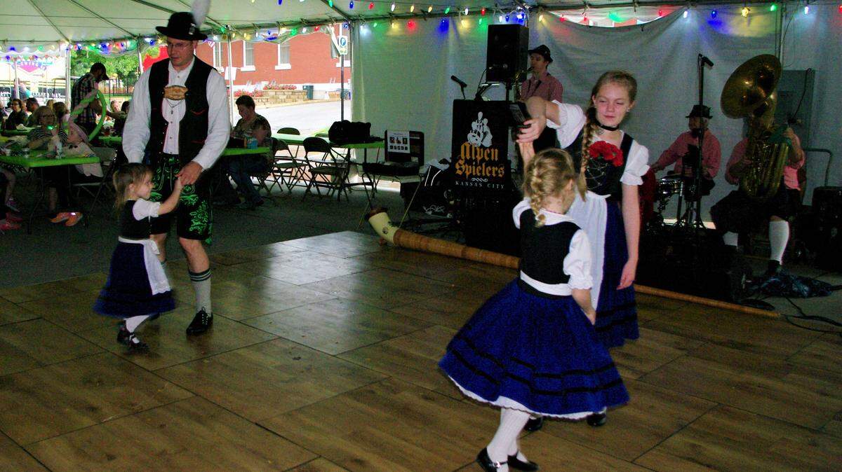 Shawnee resident Chris Beckley danced with his daughter, Mary, while his older daughter, Veronica, center, danced with Esther Taylor of North Kansas City.