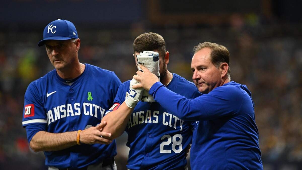 Kansas City Royals center fielder Kyle Isbel (28) walks off the field after getting hit in the face by a foul tip in the seventh inning against the Tampa Bay Rays at Tropicana Field on May 25, 2024.