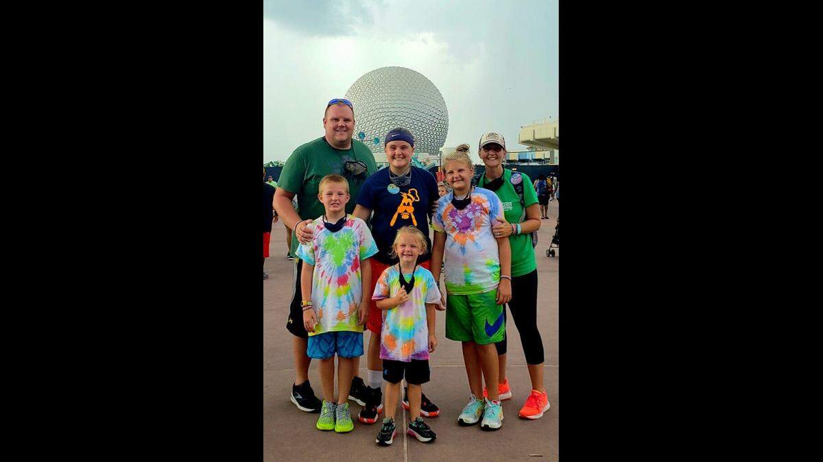 Josh Dirks, left, was an assistant football coach at Olathe North High School. He and his wife Tiffany have four kids, Ella, Belle, Beau and Ivy Jo.