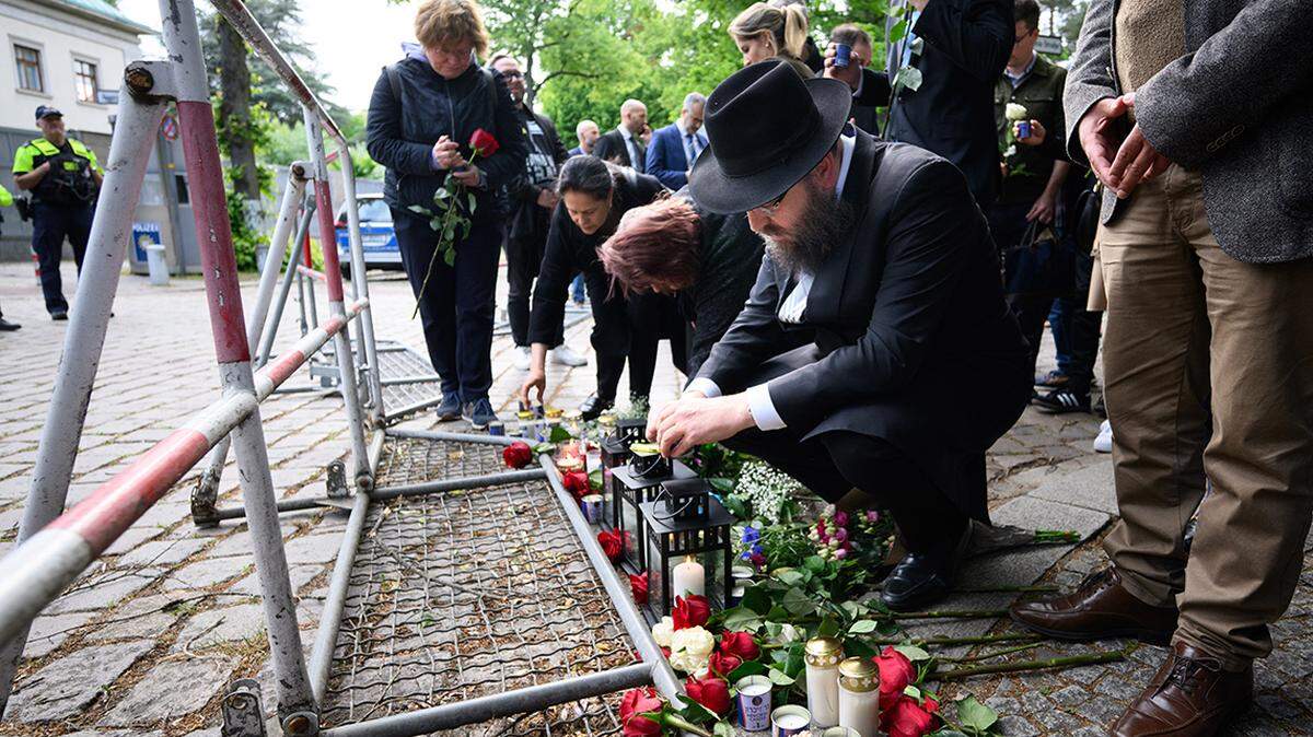 The Jewish community lights candles at a memorial service in memory of the two individuals killed at the Israeli Embassy in Washington, D.C.