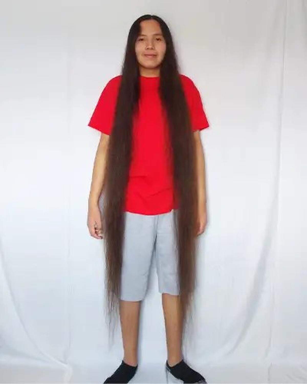 The 17-year-old’s hair is 5 feet and 3.3 inches long.