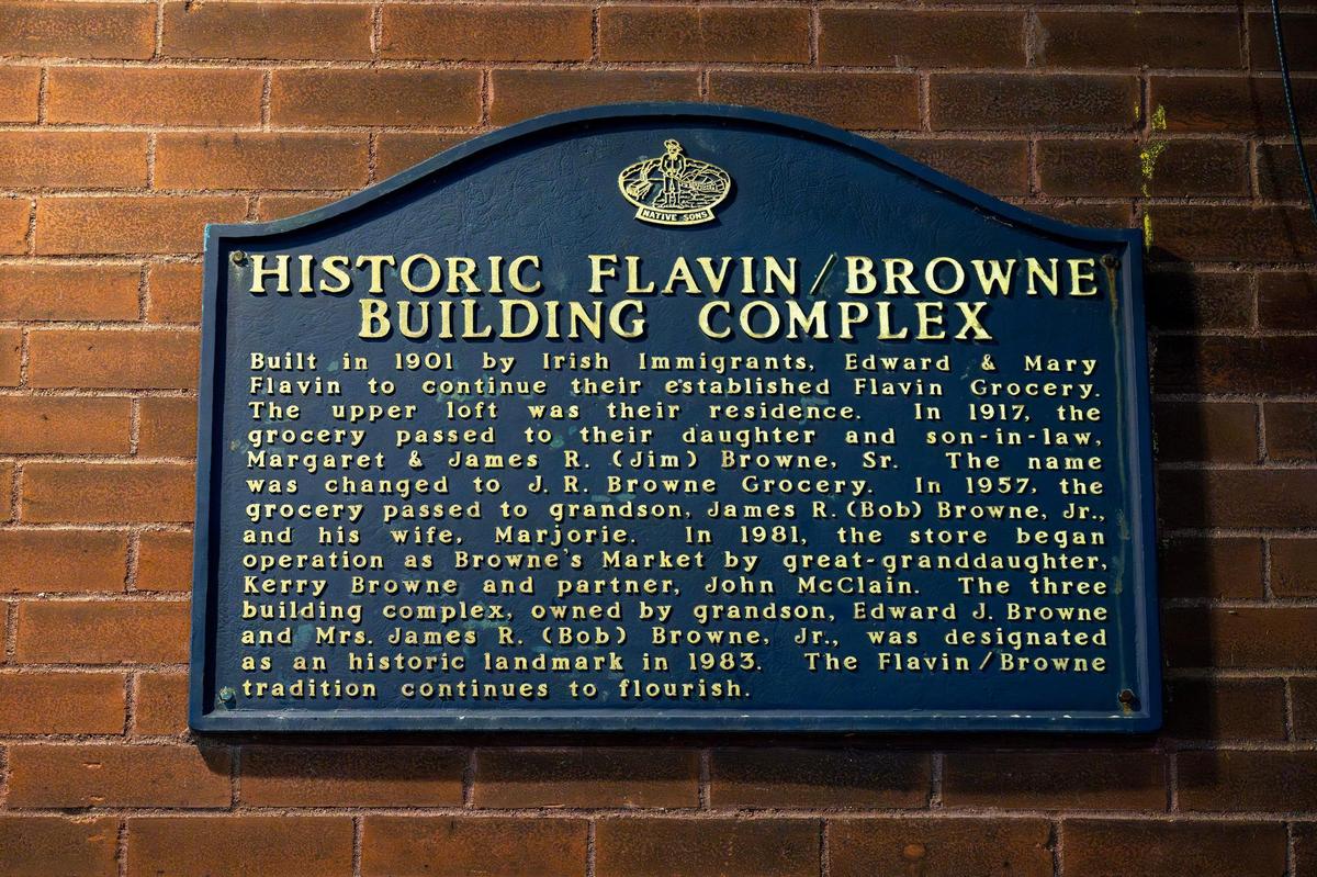 A sign on the market designates the building as a historical landmark and tells the history and linage of Browne’s ownership.