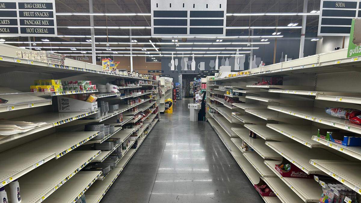 Barren shelves at the Sun Fresh at Linwood Shopping Center.