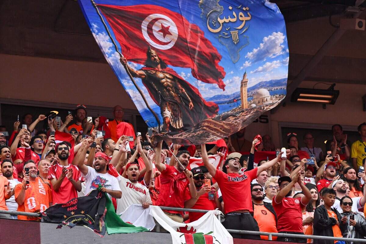 Tunisian fans wave a banner ahead of the Netherlands vs. Tunisia FIFA World Cup group-stage soccer match at Kansas City (Arrowhead) Stadium in Kansas City on Thursday, June 25, 2026.