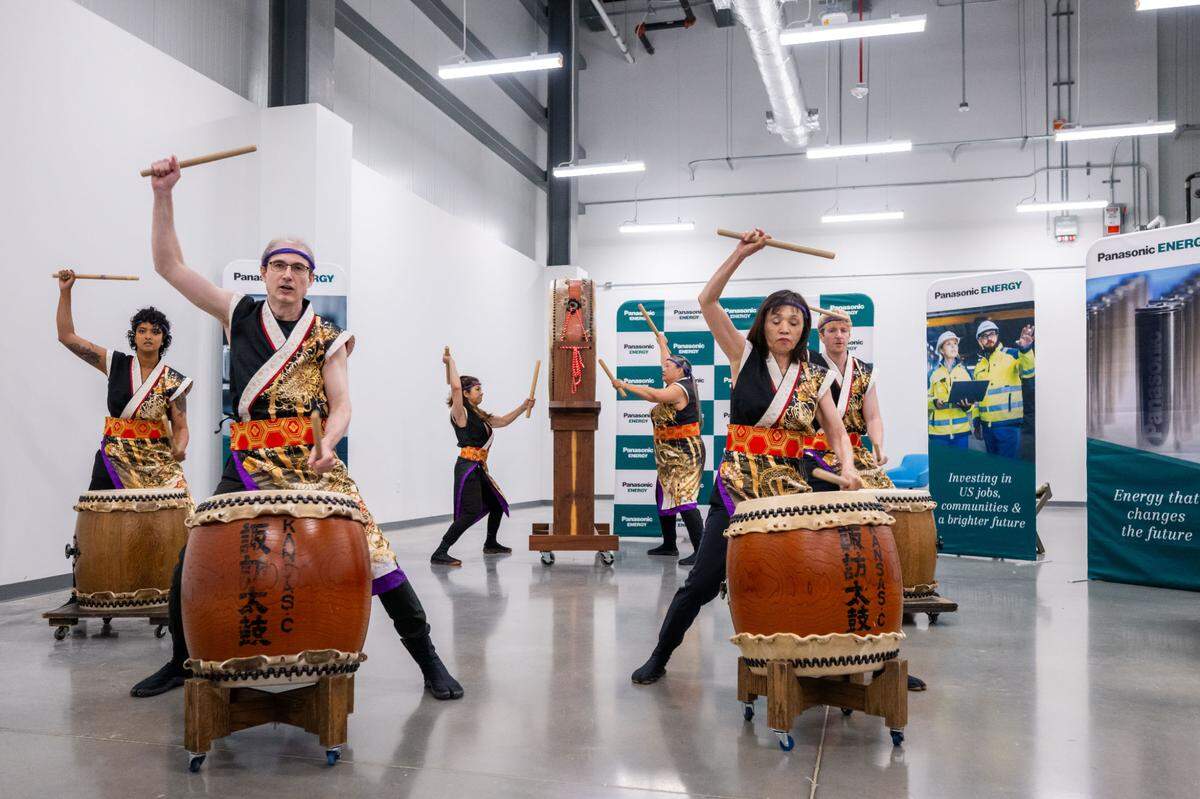 Visitors were greeted by traditional Japanese taiko drums during the grand opening of the new Panasonic electric vehicle battery plant on Monday, July 14, 2025 in De Soto, Kansas. The plant is the largest ever built by Panasonic and is expected to create thousands of jobs.