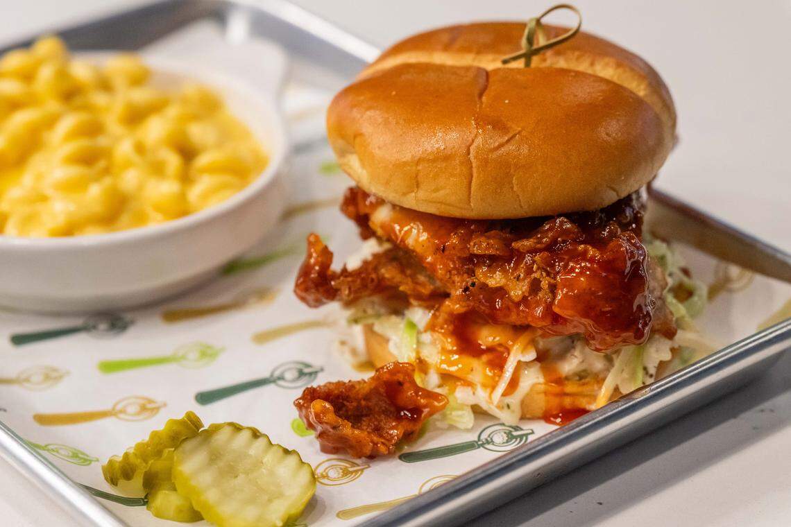 The Hot Honey Crispy Chicken Sandwich at Tap-Ins at the Greenhouse, a new restaurant/mini golf concept in Overland Park, on Wednesday, December 3, 2025.