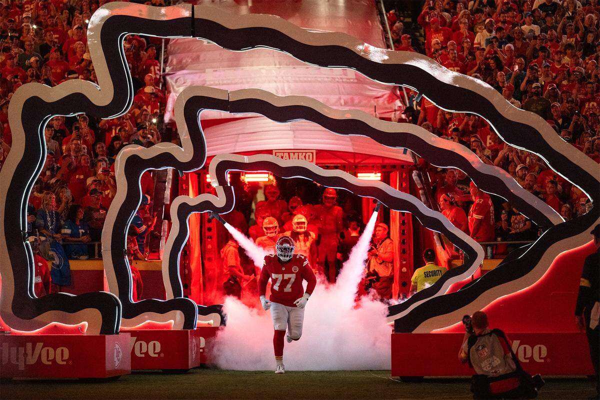 Kansas City Chiefs offensive tackle Jaylon Moore (77) enters the field at GEHA Field at Arrowhead Stadium for the game against the Detroit Lions on Sunday, October 12, 2025, in Kansas City.