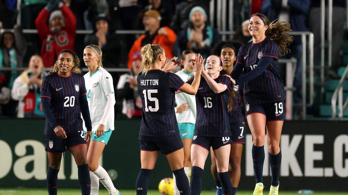 KANSAS CITY, MISSOURI - OCTOBER 29: Rose Lavelle #16 and Claire Hutton #15 of the United States celebrate after a goal during the first half of the match against New Zealand at CPKC Stadium on October 29, 2025 in Kansas City, Missouri. (Photo by Jamie Squire/Getty Images)