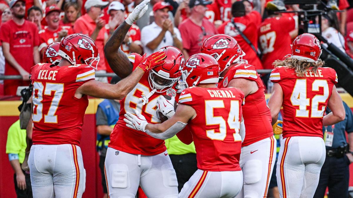 Teammates celebrate with Kansas City Chiefs offensive tackle Wanya Morris (64) after he caught a pass for a touchdown in the third quarter against the Cincinnati Bengals Sunday, Sept. 15, 2024, at GEHA Field at Arrowhead Stadium.