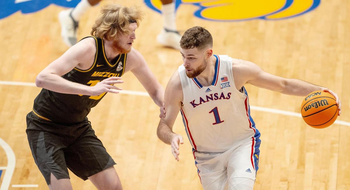 Missouri Tigers center Connor Vanover (75) guards Kansas Jayhawks center Hunter Dickinson (1) during an NCAA basketball game on Saturday, Dec. 9, 2023, in Lawrence, Kan.