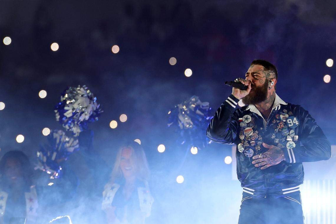 Post Malone performs at halftime of a Thanksgiving Day NFL game between the Dallas Cowboys and the Kansas City Chiefs at AT&T Stadium in Arlington, Texas on Thursday, Nov. 27, 2025.