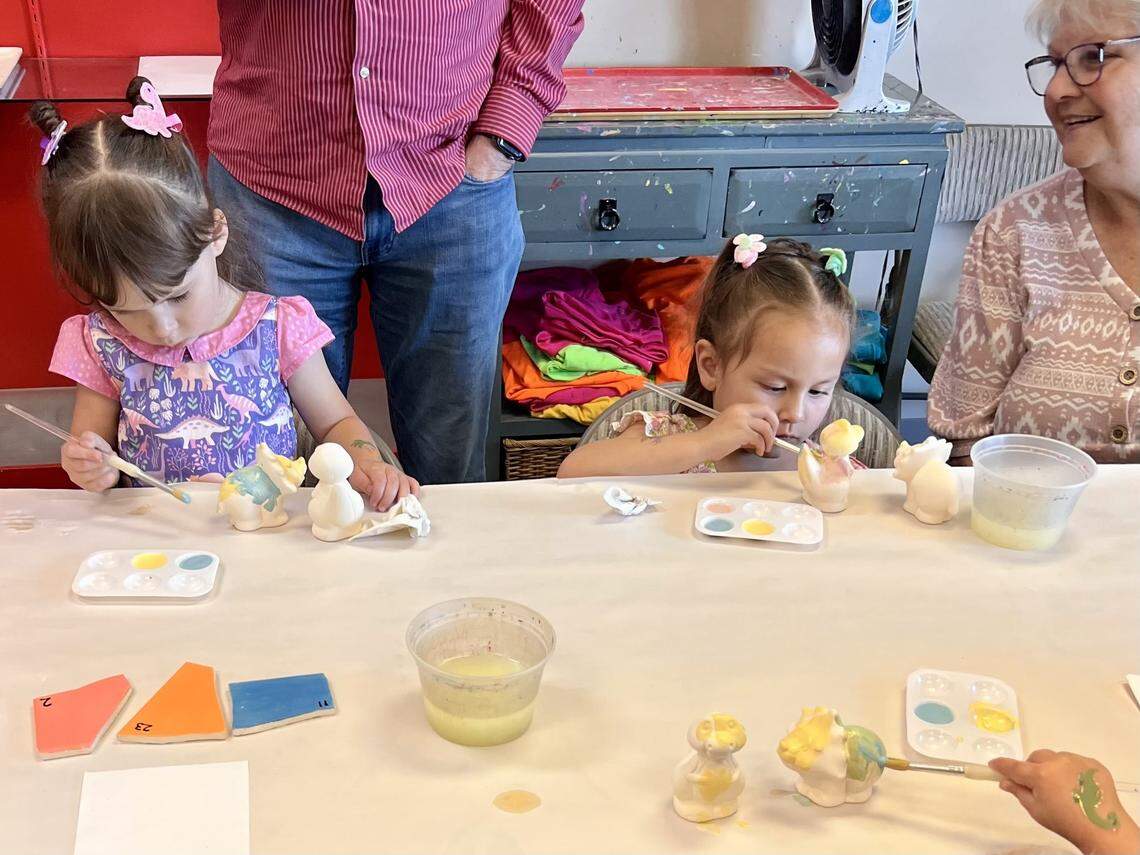 Maylinn Lacen, far left, celebrates her birthday with friends at her family’s pottery studio.