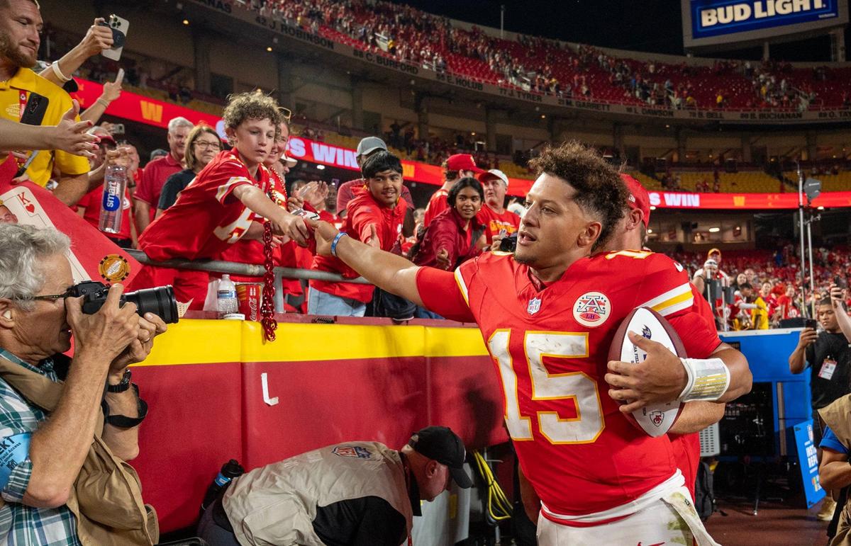 Kansas City Chiefs quarterback Patrick Mahomes (15) greeted fans after the team defeated the Baltimore Ravens, 27-20 on Thursday, Sept. 5, 2024, at GEHA Field at Arrowhead Stadium.