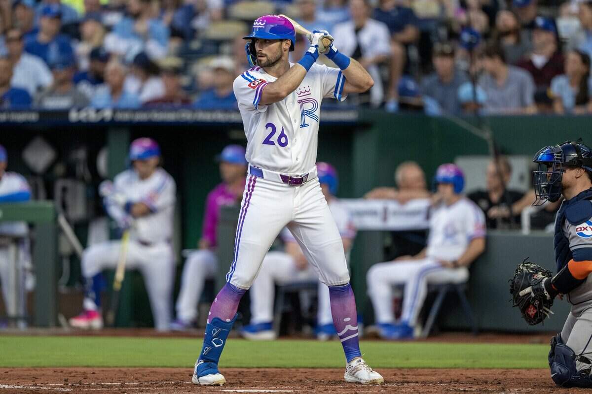 Wearing the Kansas City Royals' new "Forever Fountains" City Connect uniform, center fielder Kameron Misner (26) waits for a pitch in the first inning during a game against the Houston Astros on Friday, June 12, 2026, at Kauffman Stadium in Kansas City.
