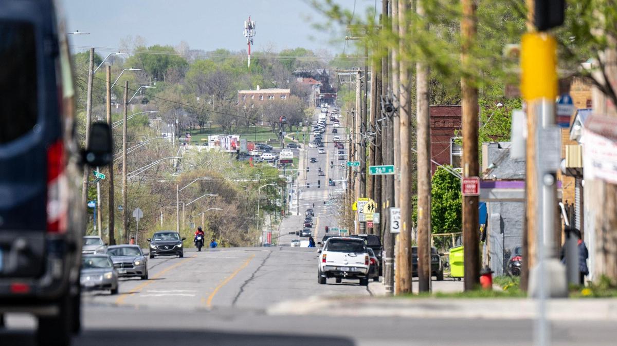 Vehicles are seen along Prospect Avenue near 27th Street on Thursday, April 10, 2025, in Kansas City. The area is in part of the city’s plans to add density and development along the Prospect MAX bus line.