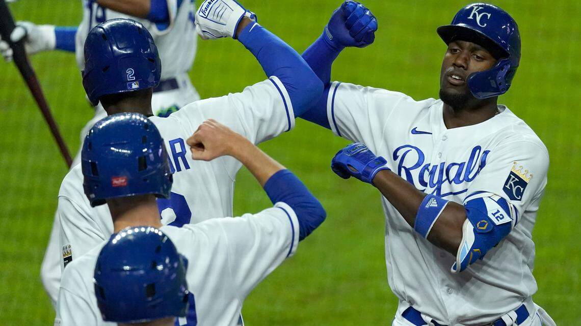 Kansas City Royals’ Jorge Soler, right, celebrate with teammates after hitting a solo home run during the seventh inning of a baseball game against the Milwaukee Brewers Wednesday, May 19, 2021, in Kansas City, Mo. (AP Photo/Charlie Riedel)