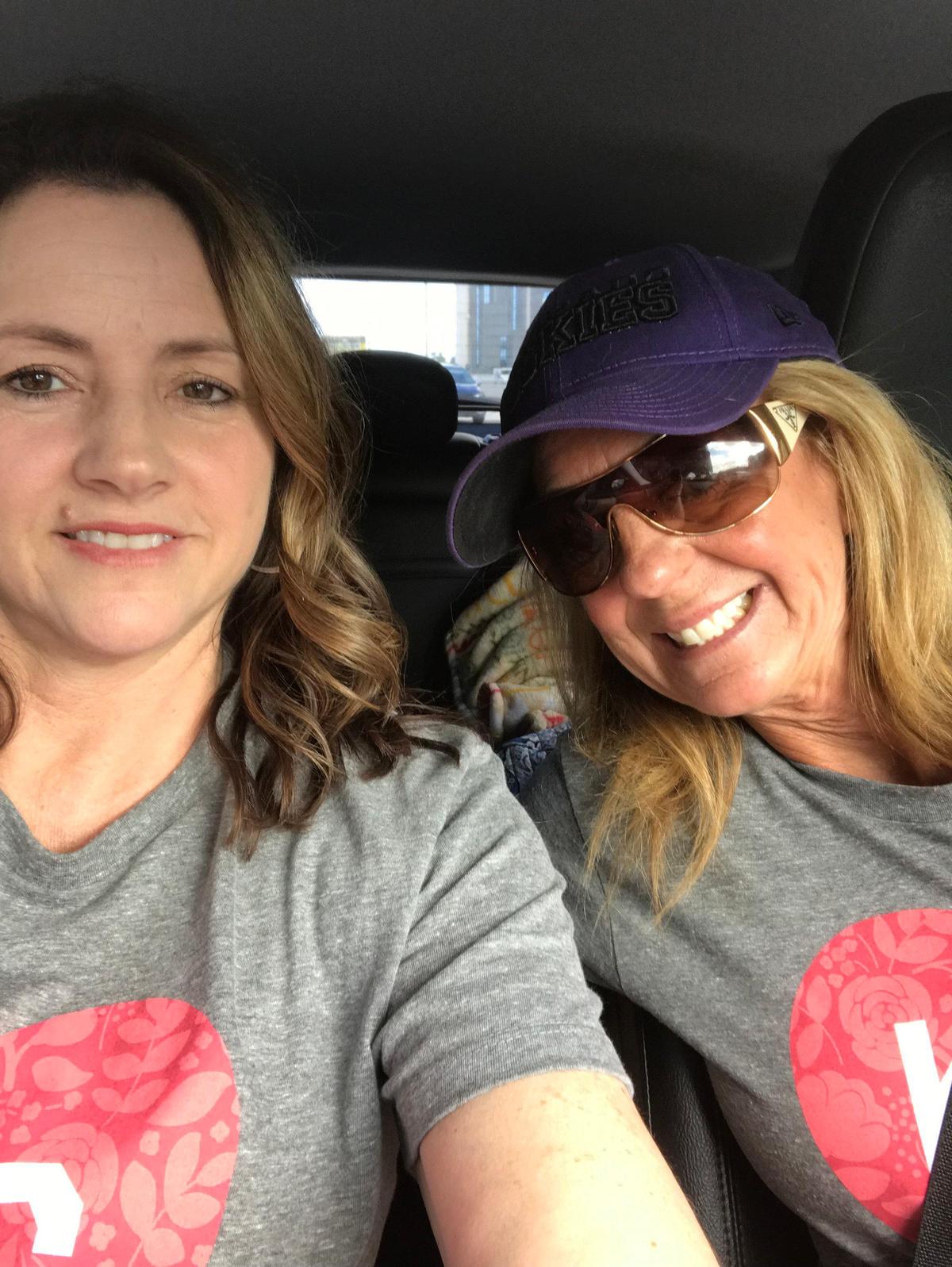 Missy Pint of Lenexa (left) and Jennifer Welker of Parkland, Fla., on their way to deliver 3,550 chocolate bars to Marjory Stoneman Douglas High School in Parkland.