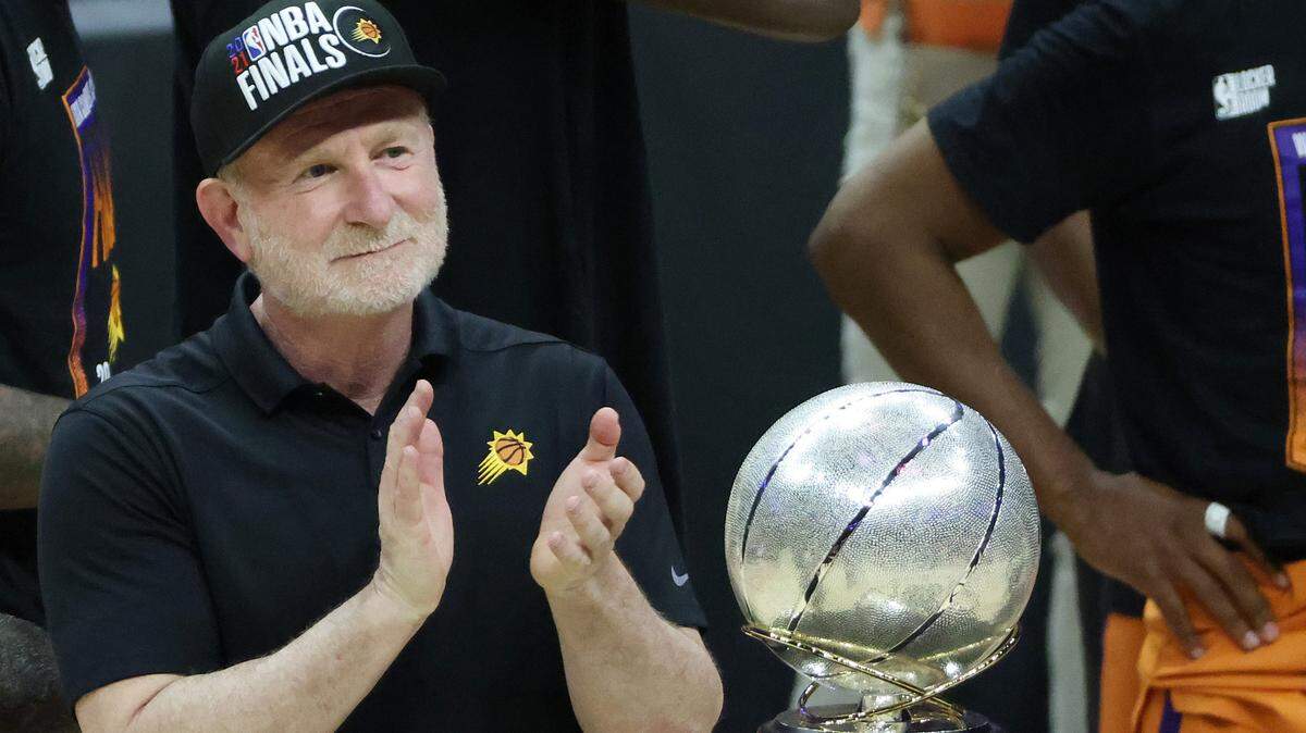 Phoenix Suns owner Robert Sarver stands with the Western Conference Championship trophy after the Suns eliminated the Los Angeles Clippers in Game 6 of the Western Conference Finals at Staples Center on June 30, 2021, in Los Angeles. (Harry How/Getty Images/TNS)