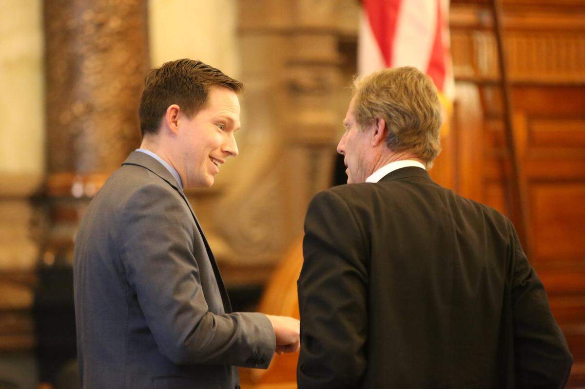 Sen. Chase Blasi, R-Wichita, talks with Sen. Rick Billinger, R-Goodland.