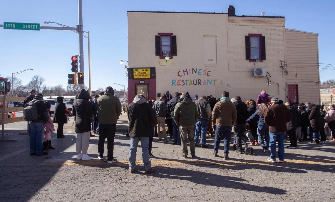 Friends and family gather to celebrate the 50th anniversary of Tao Tao Chinese restaurant in Kansas City, Kansas, on Saturday, Feb. 12, 2022.