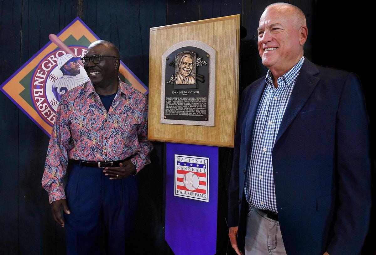In partnership with the Kansas City Royals and the National Baseball Hall of Fame, the Negro Leagues Baseball Museum unveiled Buck O’Neil’s Hall of Fame plaque Friday morning at the museum located in the 18th and Vine District. The plaque traveled from Cooperstown to Kansas City for public display, and Bob Kendrick, left, president of the museum,and friend Don Munce, of Lee’s Summit, were two of the first to be photographed with O’Neil’s historic honor.