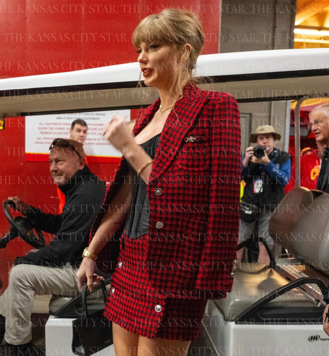 Taylor Swift wore head-to-toe Versace to the Chiefs-Broncos game Sunday at GEHA Field at Arrowhead Stadium.