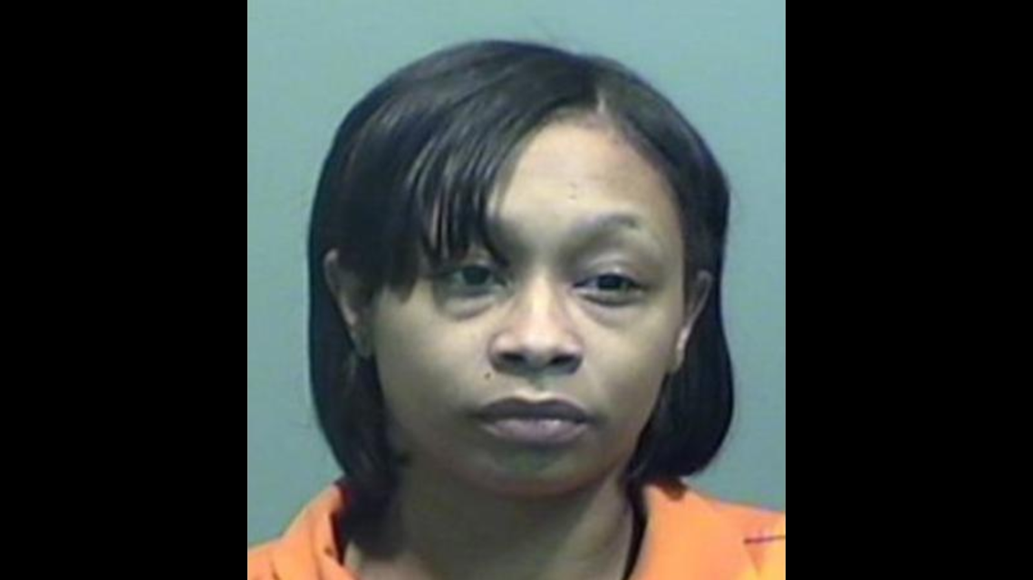 Brittani Felton, 33, was arrested after police say she fired a gun into a Taco Bell drive-thru window in Michigan.