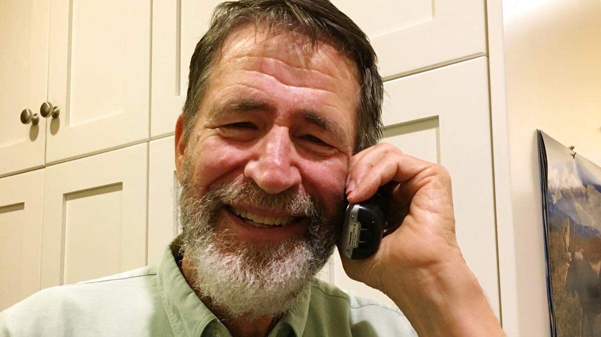 George P. Smith talks on the phone with The Associated Press at his home in Columbia, Mo., Wednesday Oct. 3, 2018, after learning he had won the 2018 Nobel Prize in Chemistry. Frances Arnold of the California Institute of Technology, Smith of the University of Missouri and Gregory Winter of the MRC molecular biology lab in Cambridge, England were announced winners of the 2018 Nobel Prize in Chemistry by The Royal Swedish Academy of Sciences on Wednesday. (Marjorie Sable via AP)