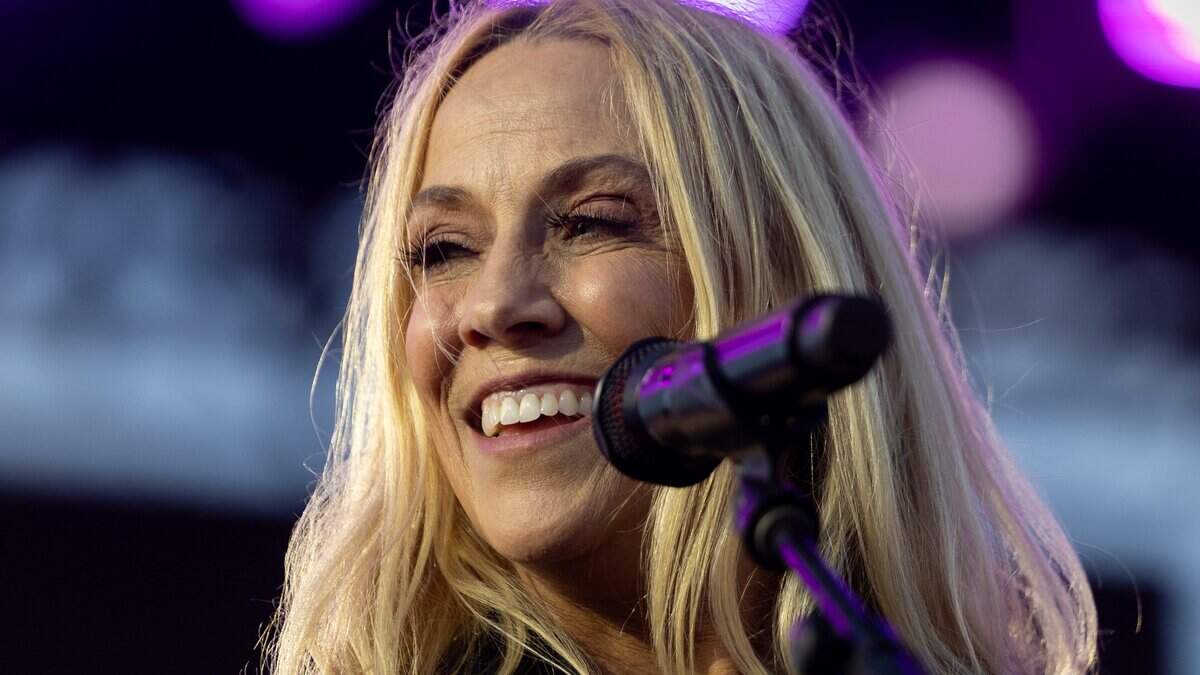 Sheryl Crow smiles at the crowd in-between verses during their FIFA Fan Fest concert at Fan Fest on Friday, July 10, 2026.