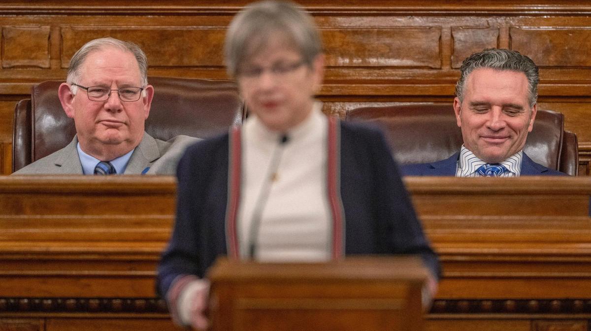 Kansas House Speaker Dan Hawkins, left, and Senate President Ty Masterson smile as they watch Kansas Governor Laura Kelly speak during the State of the State address at the Kansas State Capitol on Wednesday, Jan. 10, 2024, in Topeka, Kansas.