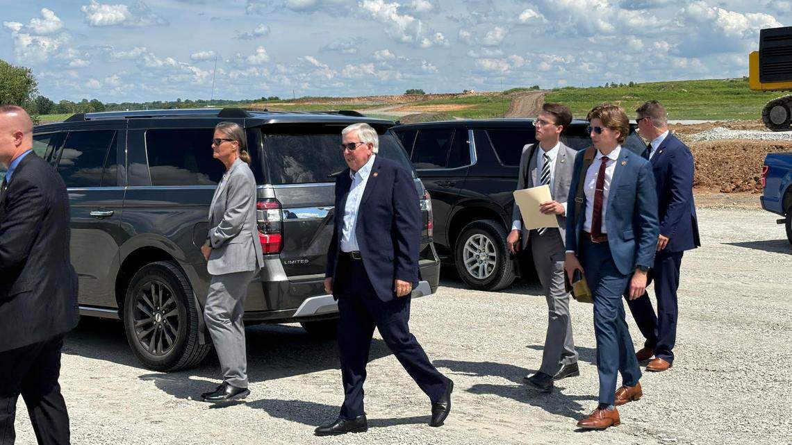 Gov. Mike Parson arrives at the construction site of an expansion of Kansas City’s National Security Campus. He signed tax breaks into law to aid the expansion.