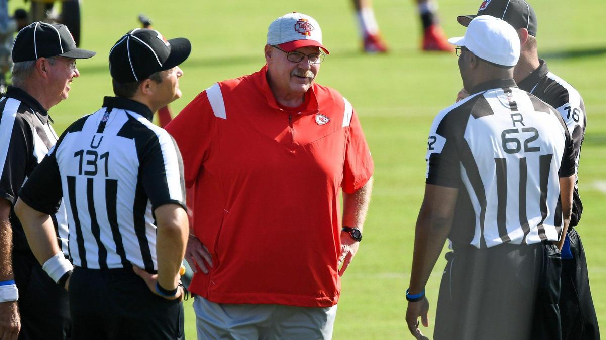 Kansas City Chiefs head coach Andy Reid talks with officials before the Kansas City Chiefs training camp at Missouri Western State University in St. Joseph, Missouri, Thursday, July 29, 2021.