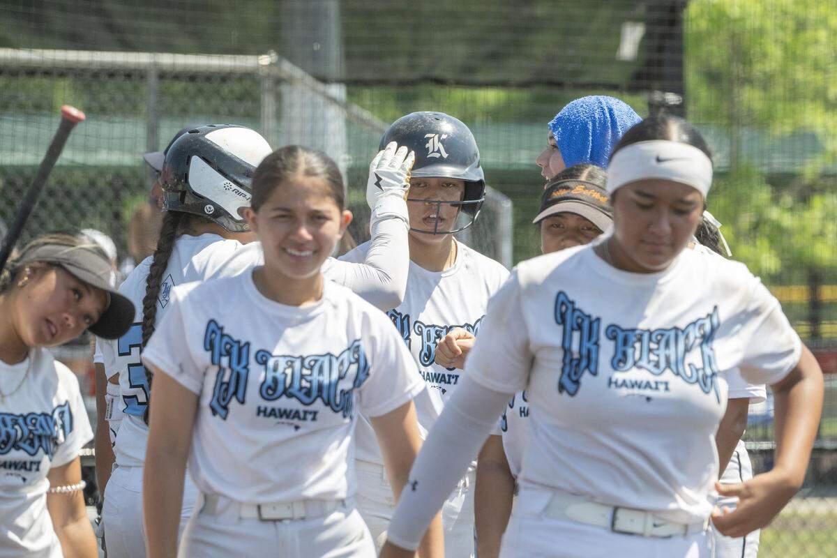 LK Black Hawaii cheer on catcher Kezia Lucas after hitting a home run during a 2024 Top Gun Invitational fast-pitch softball game against California’s BSC Bengals.