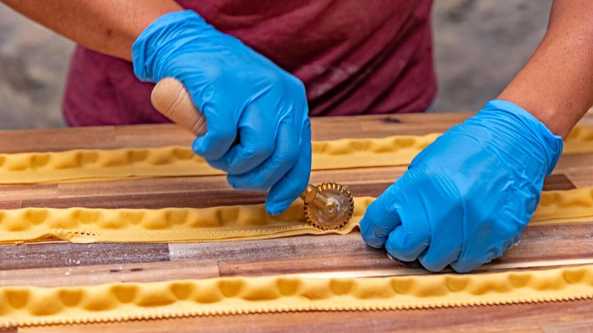 Rocrigo Bararrios forms the pasta to give it its distinctly serrated edge at Zero Zero Handmade Pasta.