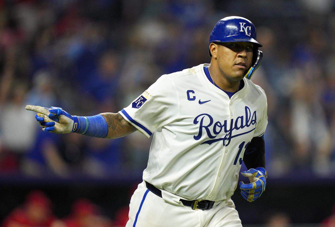 Royals catcher Salvador Perez gestures to the home dugout after hitting a tying home run in the seventh inning against the Los Angeles Angels during a Major League Baseball game at Kauffman Stadium in Kansas City on Thursday, Sept. 4, 2025.