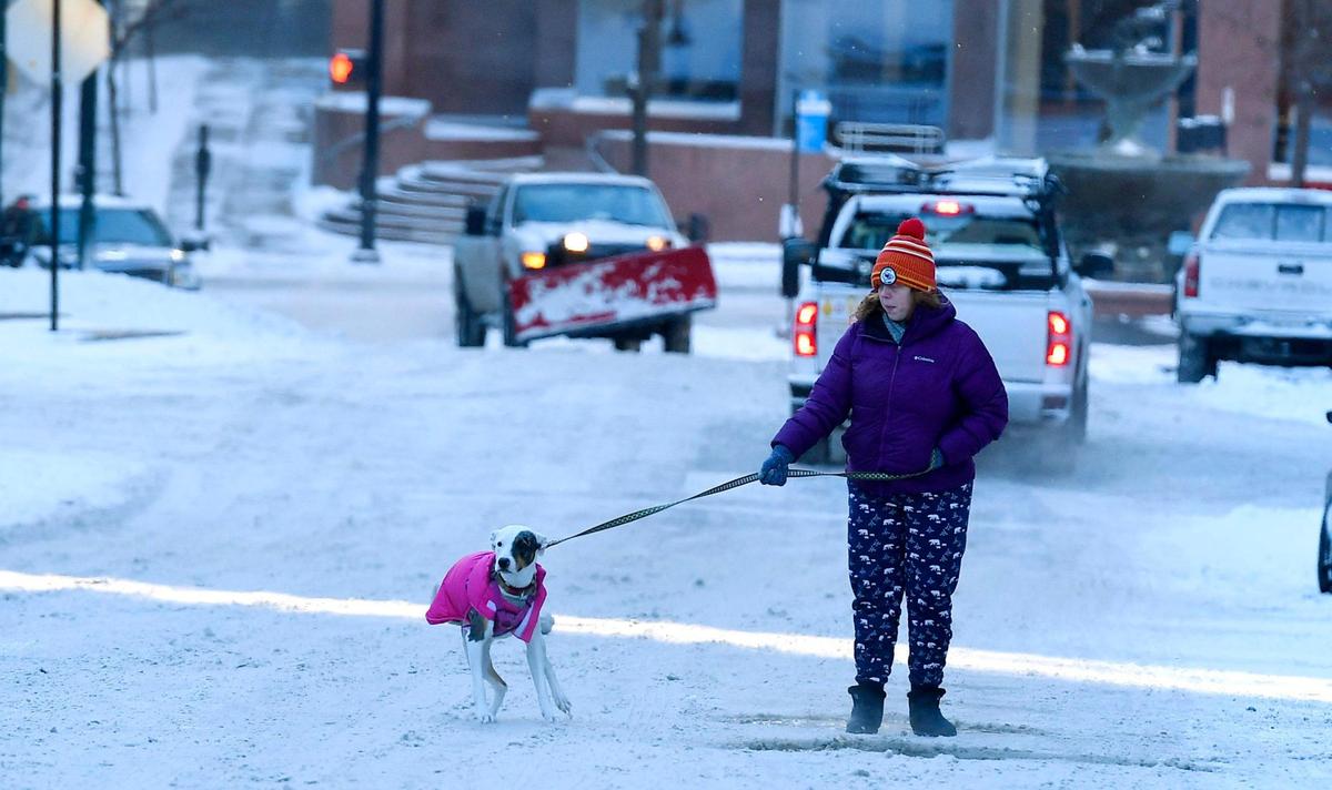 With wind chills dipping well below zero Tuesday morning, pedestrians and animals alike navigated the frozen streets of downtown Kansas City, near 10th and Baltimore. Wind chills were expected to be below zero again Tuesday night and the forecast for Wednesday called for cloudy skies and a high of 20.