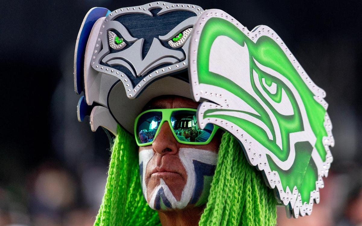 A Seattle Seahawks fan stands during the NFL Draft outside of Union Station on Thursday, April 27, 2023, in Kansas City.