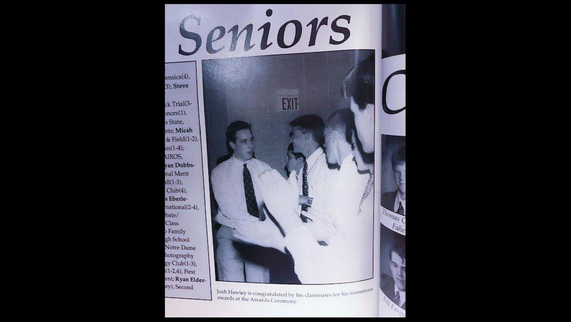 The caption on this photo in the 1998 Rockhurst High School yearbook: “Josh Hawley is congratulated by his classmates for his numerous awards at the Awards Ceremony.”